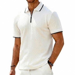 Detail of white men's polo shirt with waffle texture and black contrast trim zipper