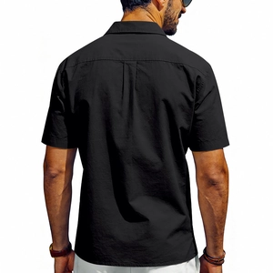 Detail of the back box pleat on a black short sleeve shirt for men in casual cargo style