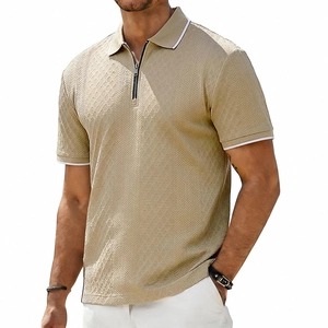 Detail of men's polo shirt with V-shaped knit texture and white striped zip collar