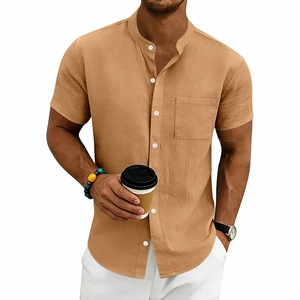Close-up of khaki linen shirt featuring a mandarin collar and breast pocket detail
