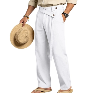 Detail of white linen trousers for men with a cross-laced waist design and natural texture
