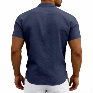 Close-up back view of a navy blue short-sleeve linen shirt showing fabric texture