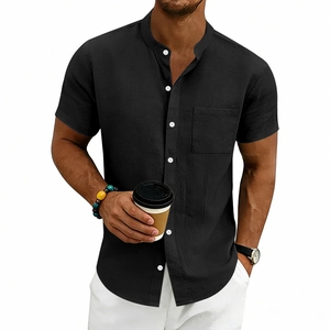 Detail of black linen short sleeve shirt with white buttons and stand collar