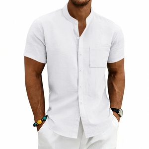 Detail view of men's white linen shirt showing the stand collar and chest pocket