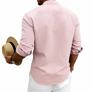 Detail of pink linen blend shirt with curved hem and textured fabric on male model