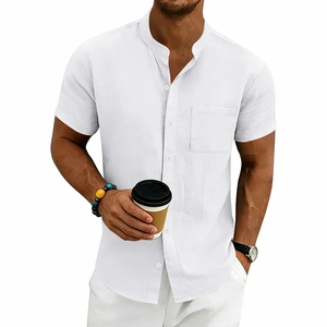 Detail of white linen short sleeve shirt with grandad collar and front chest pocket