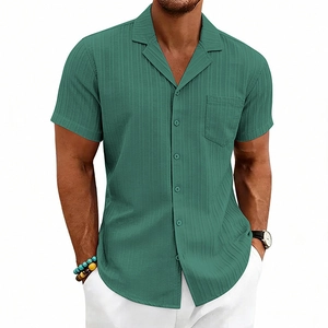 Detail of dark green short-sleeved Cuban collar shirt with vertical stripe texture