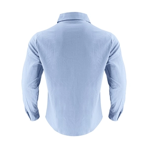 Rear view of light blue linen shirt showing textured fabric and tailored fit on white background