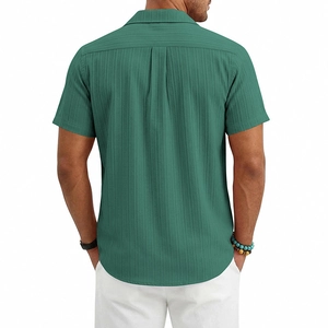 Detail view of dark green short sleeve shirt back featuring vertical striped texture