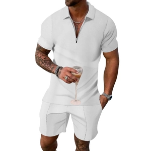 Close-up of white waffle knit texture on men's summer polo shirt and shorts set