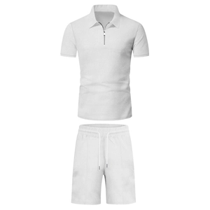 Close-up of waffle knit texture on white men's polo shirt and drawstring shorts
