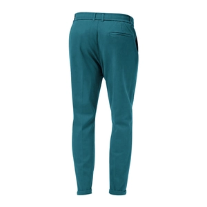 Detail of dark green casual trousers showing elastic waistband and back pocket