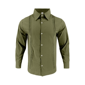 Close-up of olive green linen shirt featuring vertical woven patterns and white buttons