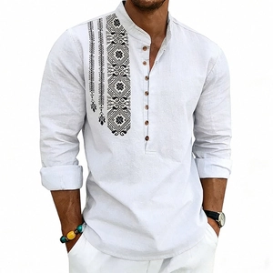 Detail of white linen shirt showing ethnic totem print and wooden buttons for men