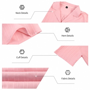 Detailing pink Cuban collar shirt showing neck, hem, cuff and ribbed fabric texture