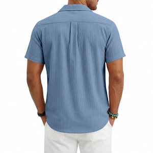 Detailed back view of men's blue short sleeve shirt with vertical texture and back pleat