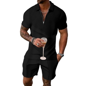 Men's summer casual set in black waffle fabric with quarter-zip polo and elastic shorts