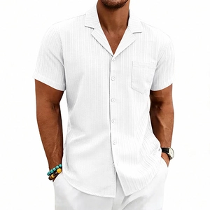 Detail showing white short sleeve Cuban collar shirt with vertical stripe texture and pocket