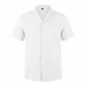 Close-up of white short-sleeved Cuban collar shirt with vertical striped texture and chest pocket