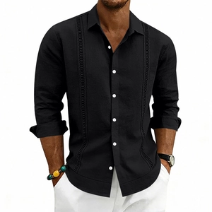 Detailed view of hollow-out embroidery on a black men's long sleeve linen shirt