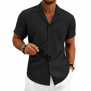 Detailed close-up of men's black short-sleeve Cuban collar shirt with vertical stripe texture