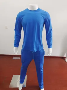 Detail of royal blue men's sports set with drawstring waist and ribbed cuffs