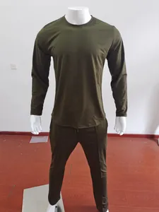 Detailed view of army green men's athletic long sleeve tracksuit set with drawstring pants