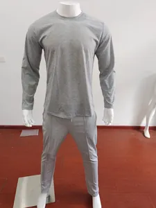 Detailed view of men's gray knitted tracksuit with long-sleeve tee and fitted joggers