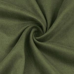 Macro di tessuto spazzolato verde oliva con ombre morbide e una trama ricca