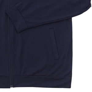 Close-up of deep blue bomber jacket showing zipper, ribbed cuffs, and side pocket detail