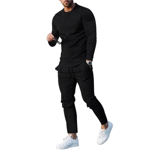 Men's black athletic tracksuit set featuring slim-fit long sleeve top and drawstring joggers
