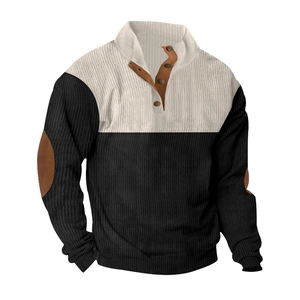 Detail showing the ribbed knit texture and brown faux leather elbow patches on the sleeve