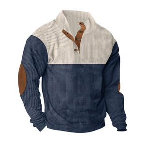 Detail of color-block corduroy sweatshirt with buttoned stand collar and elbow patches