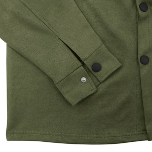 Detail of olive green suede jacket showing matte black buttons and precision stitching