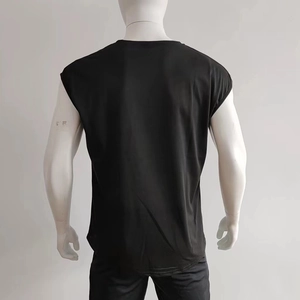 Rear view detail of a solid black sleeveless casual cotton blend t-shirt on a mannequin