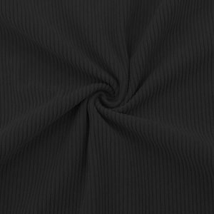 Close-up of black vertical ribbed knit fabric texture with soft and stretchy material