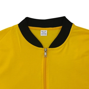 Detail view of yellow bomber jacket featuring black ribbed collar and silver metal zipper