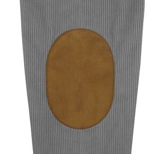 Detail of grey ribbed sweater sleeve with brown oval elbow patch and stitching