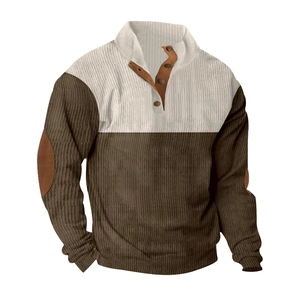 Detail of corduroy Henley shirt showing bicolored paneling and elbow patches