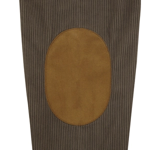 Detail of dark brown ribbed knit sweater sleeve with a tan faux suede elbow patch