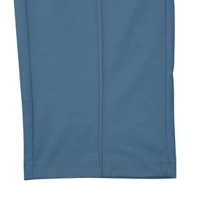 Detail view of blue men's casual trousers showing double-needle stitching and pressed creases
