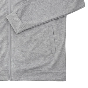 Detail of heather gray bomber jacket showing resin zipper and ribbed knit cuff texture