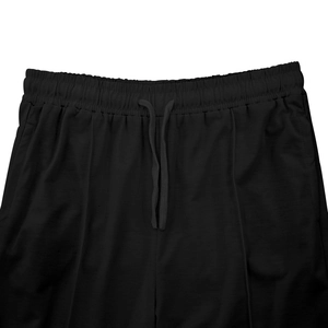 Detail of elastic waistband and black drawstring on men's cotton leisure sport trousers