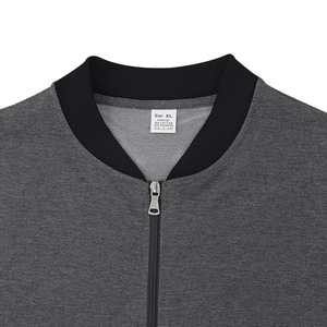 Detail of grey bomber jacket with ribbed collar, metal zipper and fabric label