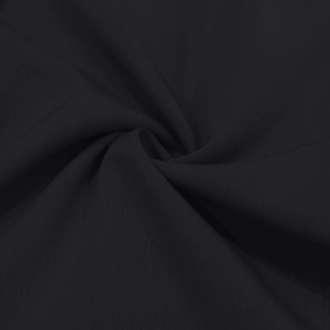 Detailopname van zwarte linnen textuur met fijne effen binding en lichte drapering