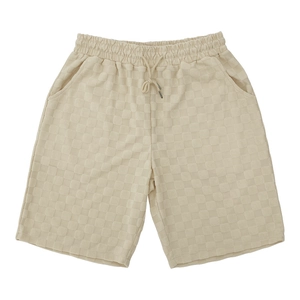 Detail of cream men's casual shorts with elastic drawstring waist and checkered texture