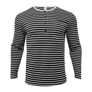 Macro detail of men's striped cotton Henley shirt with button placket and chest pocket