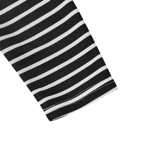 Close-up detail of knitted cuffs on men striped long sleeve henley shirt showing stitching