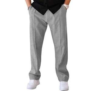 Detail of men's grey casual trousers featuring stylish front seam and adjustable drawstring