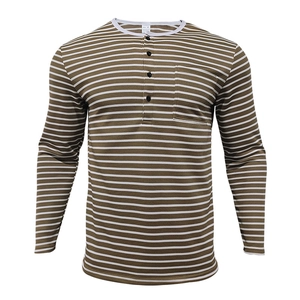 Detail of men's long sleeve Henley shirt featuring brown stripes and a functional chest pocket